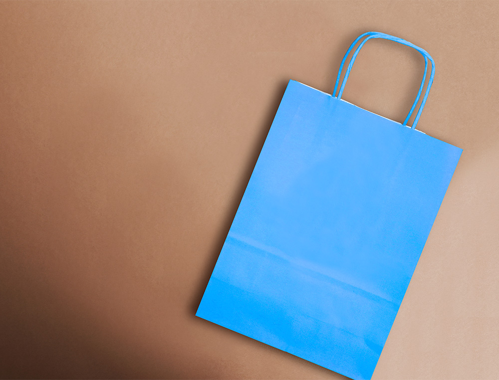 BOLSA PAPEL Q-CONNECT CELULOSA CELESTE S CON ASA RETORCIDA 240X320X100 MM